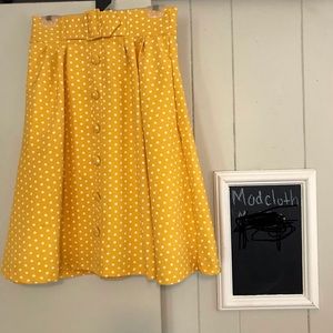 Pretty yellow polka dot high-waisted skirt